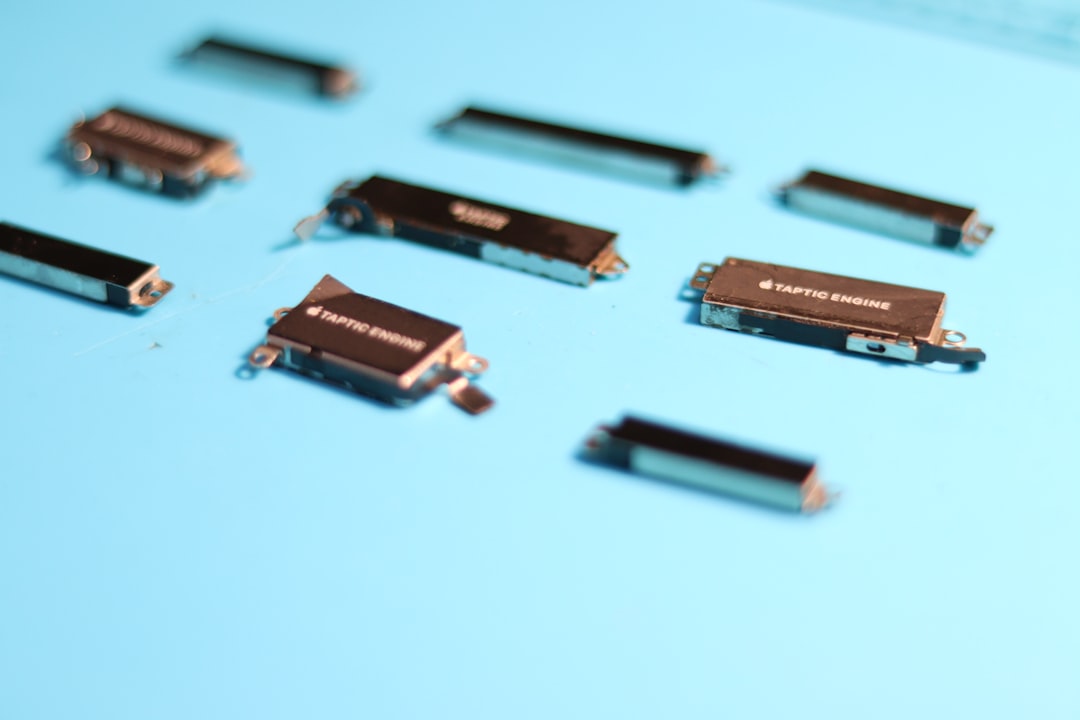 Electronic components are arranged on a blue surface.