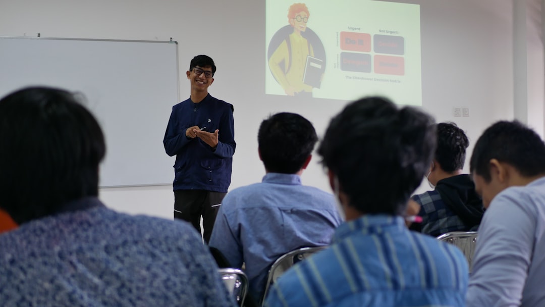 a man standing in front of a group of people