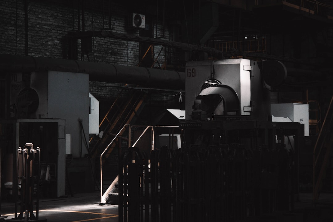 A dark room with a large machine in it