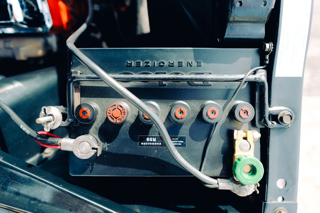Close-up of a car battery with wires connected