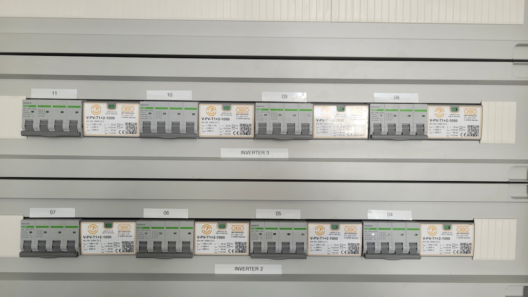 Electrical circuit breakers neatly arranged in two rows.